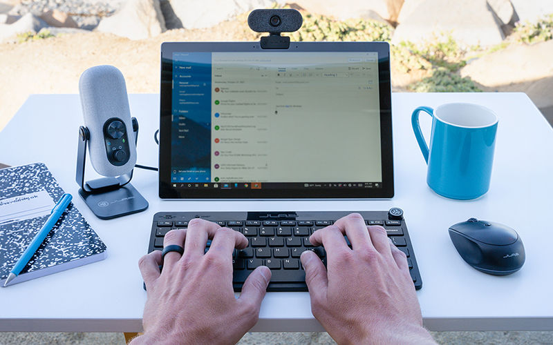 Person having a working using JLab webcam