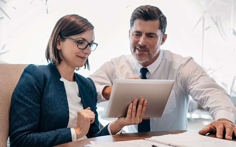 Workmates collaborating with each other