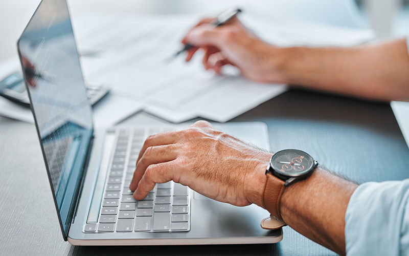 Man working using his laptop