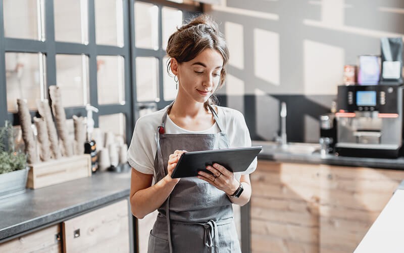 Woman using a tablet at work