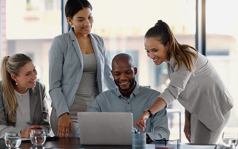 Teammates working together at the office