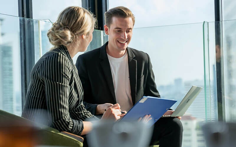 Two colleagues talking to each other