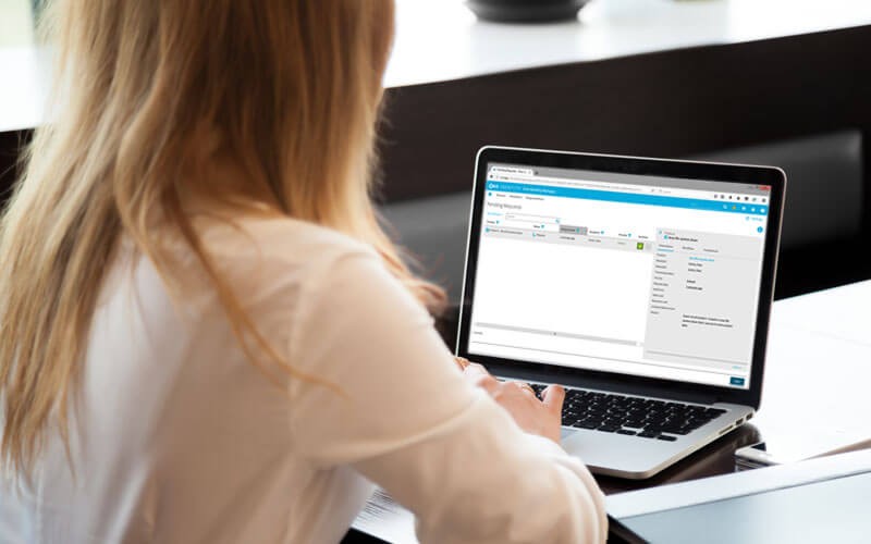 Woman using  Quest identity governance identity management software