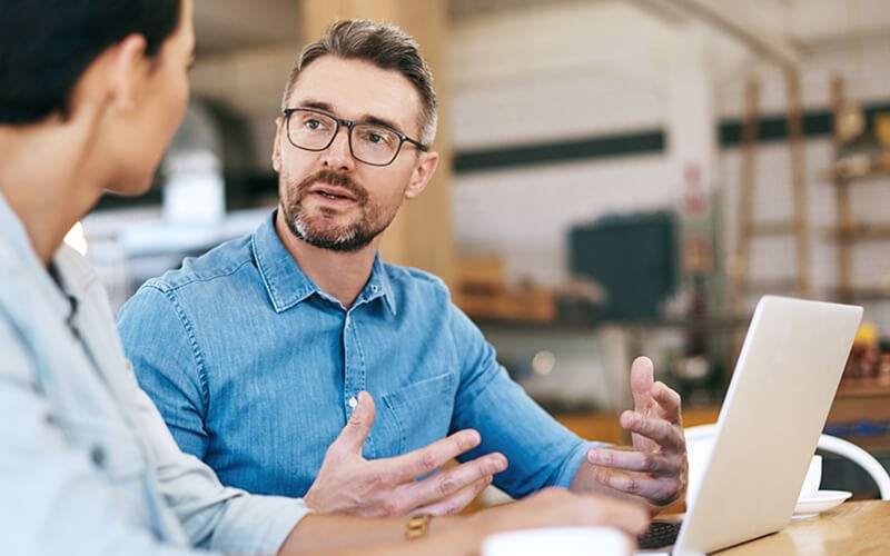 Businessman explaining new strategy to colleague