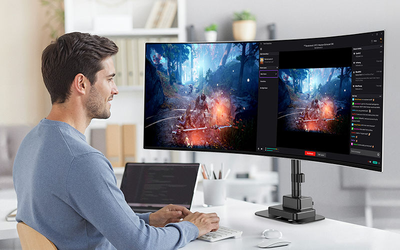 Man using a mount for this monitor