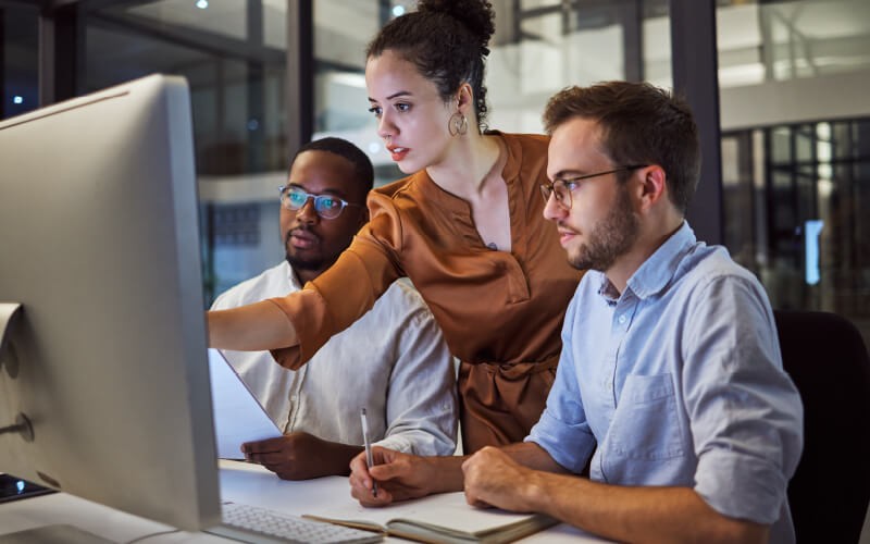 Teammates working together at the office