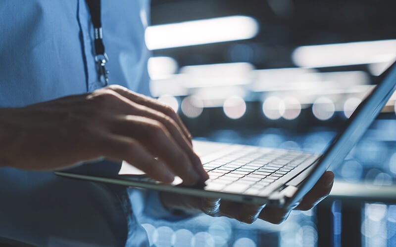 Person using a laptop at work