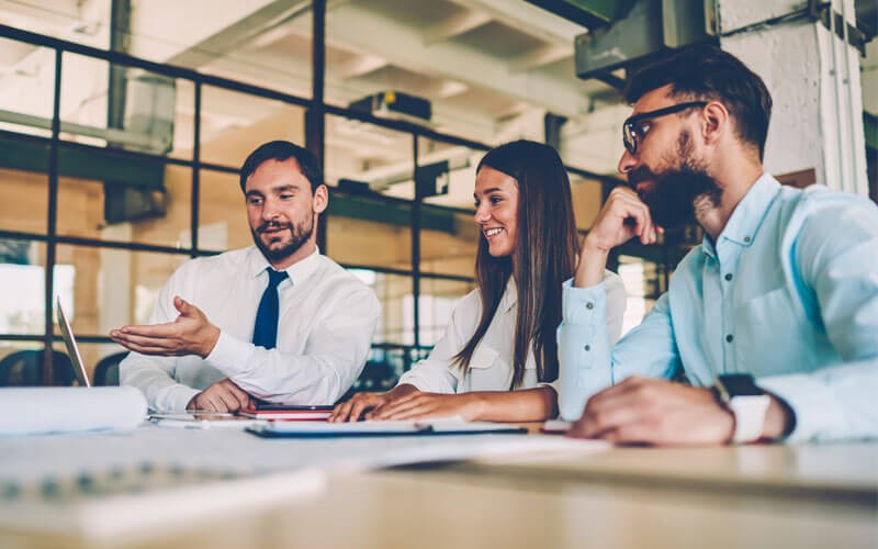 Team working together in open office