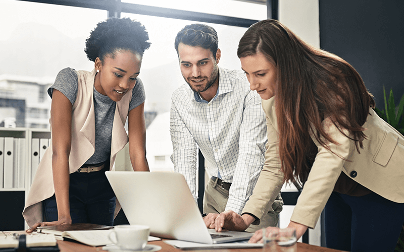 Teammates working together at the office