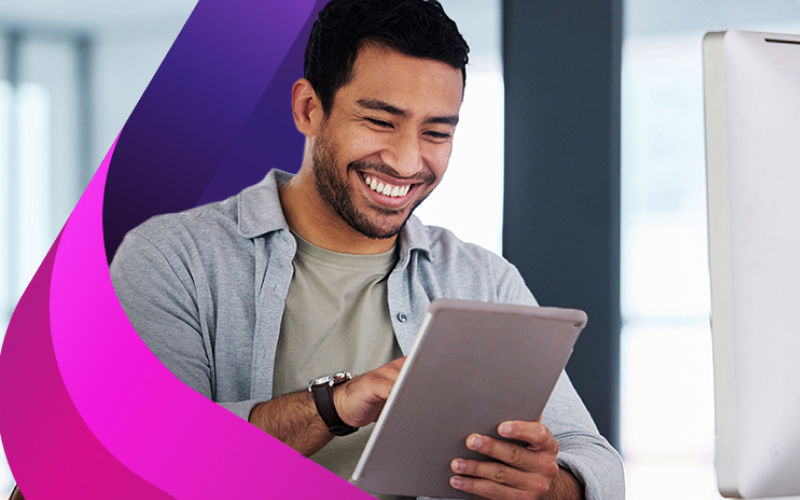 Get smarter agreements Guy at computer holding a tablet