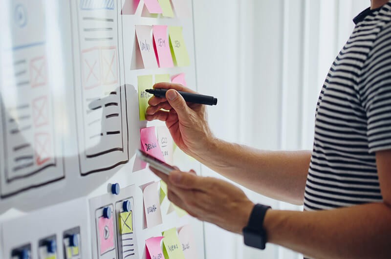 UX Designer working with client during design strategy session