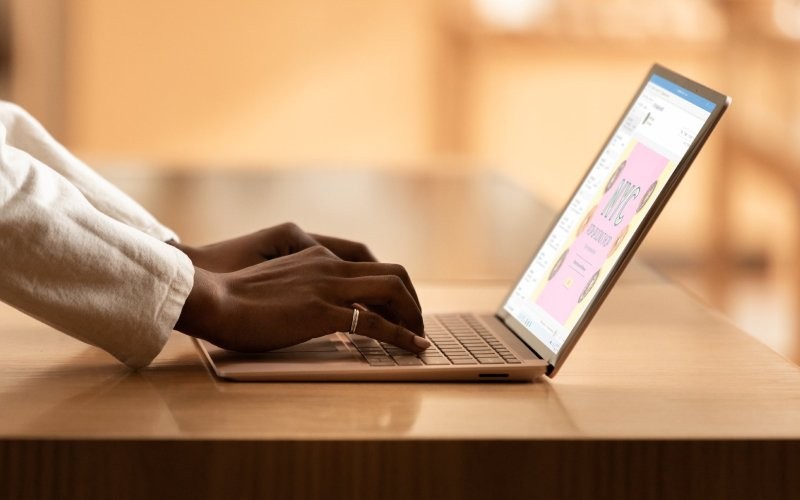 User typing on keyboard