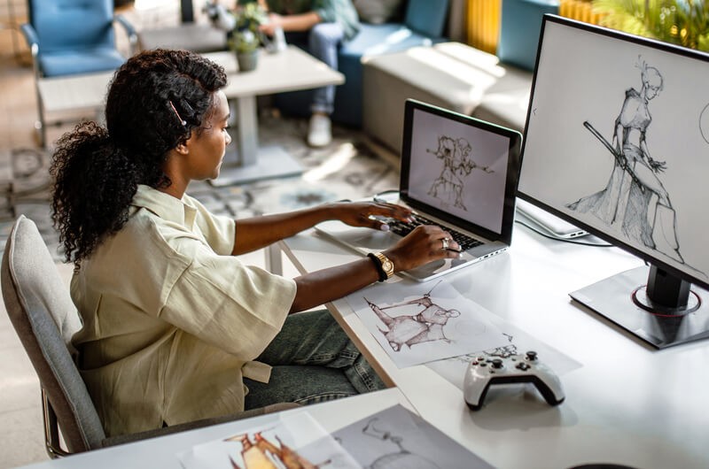 Designer working at her desk in office